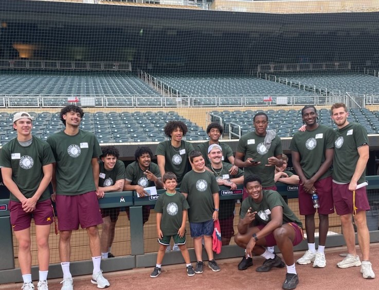 Gopher men’s basketball team helping at “Create A Memory” event